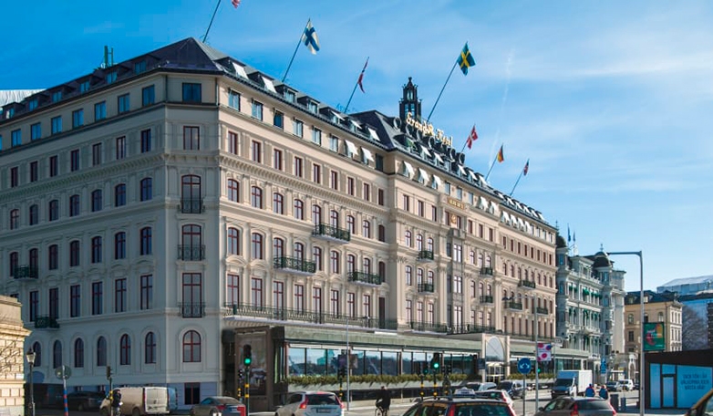 Investor checkar ut från Grand Hôtel